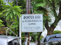 Drg. I Putu Indra Prihanjana.,M.Kes.,Sert.KGI & Drg. Hervina