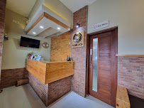 Glimlach Dokter Gigi & Implan Denpasar - drg. Wirya Pratama, MMRS