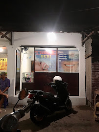 Tukang Gigi Budi