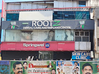 ROOTZ DENTAL CARE AND IMPLANT CENTER