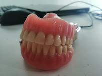 SK Dental Care and Implant Centre - Root canal treatment, extraction, teeth cleaning dentist in Murugeshpalya
