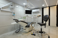 Expressions Maxillofacial Surgery & Dentirsty | Dr Adil & Dr Fatema Gandevivala