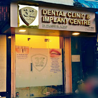 32 WHITES DENTAL