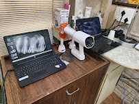 Dr TRIVEDIS COSMODENT DENTAL CENTRE