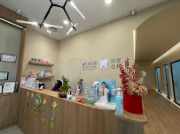 WeSmile Dental Clinic (LaLaport BBCC) - Painless Scaling, Invisalign and Implant Provider