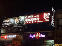 Tiew Dental OUG