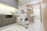 Uptown Dental Surgery - Dr. CK Sia, BDS(Adelaide)