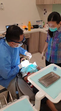 Uptown Dental Surgery - Dr. CK Sia, BDS(Adelaide)