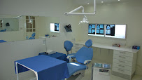 Dr Ridha BESSROUR Dental Clinic Implantology , Periodontology ,Aesthetic Dentistry , Invisalign