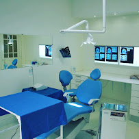 Dr Ridha BESSROUR Dental Clinic Implantology , Periodontology ,Aesthetic Dentistry , Invisalign