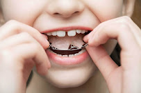 Clínica de Odontologia e Ortodontia - De Boca Aberta