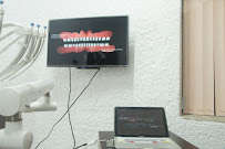 Dr. Kiyonobu Takizawa, Dentista - Odontólogo