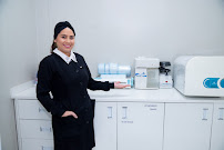 FJ Odontologia Dr. Farid M. Damen e Jennifer de Andrade