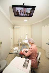 Müller & Girardi - Clínica odontológica em Maringá | Implantes | Prótese | Facetas | Canal | Aparelho Dentário