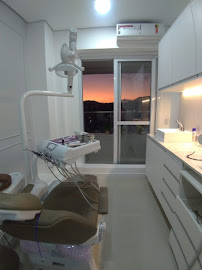 Okto Odontologia - Dentista Santos