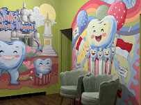 Go Smile Dental Care (drg. Ima Wijayanti., MDsc.,Sp.Perio