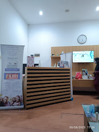Dentin - Dental Innovation (drg Samuel Wijaya Kusuma Prayitno, Sp.KG & drg Elsa Indra Lukmantono, Sp. Ort, MM)