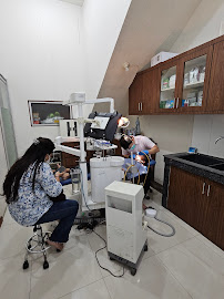 Lotus Dental Art Medan - Praktek Dokter Gigi Spesialis - drg Darius Sp.Perio, drg Felix Sp.Pros, drg Christinawaty Sp.Ort