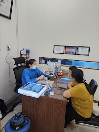 Lotus Dental Art Medan - Praktek Dokter Gigi Spesialis - drg Darius Sp.Perio, drg Felix Sp.Pros, drg Christinawaty Sp.Ort