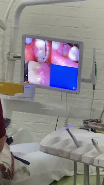 Dokter Gigi Ngumban Surbakti (Part of Medan Dental Center)