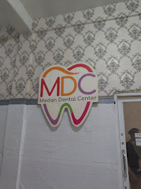 Dokter Gigi Ngumban Surbakti (Part of Medan Dental Center)