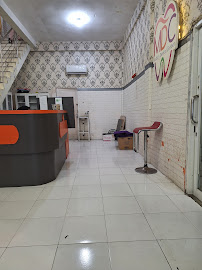 Dokter Gigi Ngumban Surbakti (Part of Medan Dental Center)