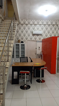 Dokter Gigi Ngumban Surbakti (Part of Medan Dental Center)