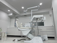 Chidlom Dental Clinic ชิดลม เดนทัล คลินิก รากฟันเทียม วีเนียร์ จัดฟัน invisalign
