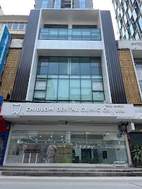 Chidlom Dental Clinic ชิดลม เดนทัล คลินิก รากฟันเทียม วีเนียร์ จัดฟัน invisalign