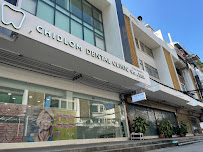 Chidlom Dental Clinic ชิดลม เดนทัล คลินิก รากฟันเทียม วีเนียร์ จัดฟัน invisalign