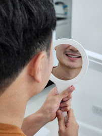 Chidlom Dental Clinic ชิดลม เดนทัล คลินิก รากฟันเทียม วีเนียร์ จัดฟัน invisalign